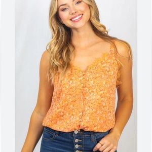 Floral bodysuit with button detail medium